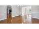 Dining room with hardwood floors, and an open layout, seamlessly connecting to other living spaces at 277 Edison Dr, Stockbridge, GA 30281