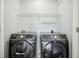 Convenient laundry room featuring a washer and dryer hookup at 277 Edison Dr, Stockbridge, GA 30281