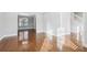 Spacious living room with hardwood floors, natural light, and an open layout at 277 Edison Dr, Stockbridge, GA 30281