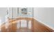 Bright living room featuring large windows and gleaming hardwood floors at 277 Edison Dr, Stockbridge, GA 30281