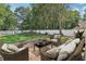 Inviting patio space with outdoor seating, perfect for relaxing and entertaining in the backyard at 277 Edison Dr, Stockbridge, GA 30281