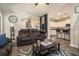 Inviting living space with an archway leading to the kitchen and staircase at 353 Daffodil Dr, Temple, GA 30179