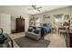 Bright main bedroom with neutral walls, a comfortable bed, and ample closet space at 353 Daffodil Dr, Temple, GA 30179