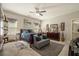 Spacious main bedroom with neutral walls, a ceiling fan, and a plush bed with decorative pillows at 353 Daffodil Dr, Temple, GA 30179