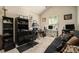 Home office space with desk, shelving, and comfortable futon for flexible use at 353 Daffodil Dr, Temple, GA 30179