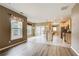 Open-concept kitchen and dining area with stainless steel appliances and a breakfast bar at 4461 Kentland Dr, Acworth, GA 30101