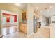 Open kitchen with stainless steel appliances and view to dining room at 4461 Kentland Dr, Acworth, GA 30101