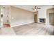 Open-concept living room featuring fireplace and hardwood floors at 4461 Kentland Dr, Acworth, GA 30101