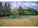 A community playground with swings, slides, and picnic tables at 4461 Kentland Dr, Acworth, GA 30101