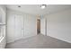 Bedroom with neutral carpet, lots of space, and attached bathroom at 5675 Laurel Ridge Cir, Atlanta, GA 30344