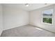 Bright bedroom with natural light and neutral carpet at 5675 Laurel Ridge Cir, Atlanta, GA 30344