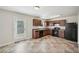 A modern kitchen with ample cabinet space, and black appliances at 5675 Laurel Ridge Cir, Atlanta, GA 30344