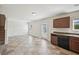 Open kitchen and dining space with access to the backyard at 5675 Laurel Ridge Cir, Atlanta, GA 30344