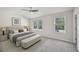Spacious main bedroom with neutral tones, a ceiling fan, and large windows at 5675 Laurel Ridge Cir, Atlanta, GA 30344
