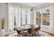 Bright dining room with natural light, modern lighting, and an elegant oval dining table at 1010 Violet Sw St # A, Atlanta, GA 30310