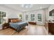 Spacious bedroom with hardwood floors, natural light, and modern design elements at 1010 Violet Sw St # A, Atlanta, GA 30310