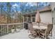 Outdoor back deck with seating and a grill perfect for entertaining and outdoor living at 1190 Mosspointe Dr, Roswell, GA 30075