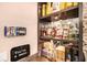 Stylish bar area showcasing displayed liquor bottles and a Steelers decorative sign at 1190 Mosspointe Dr, Roswell, GA 30075