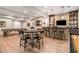 Finished basement with bar, seating, and games, ideal for recreation and relaxation at 1190 Mosspointe Dr, Roswell, GA 30075