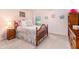 Charming bedroom with floral bedding and classic furniture at 1190 Mosspointe Dr, Roswell, GA 30075