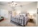 Cozy bedroom with carpet and ceiling fan at 1190 Mosspointe Dr, Roswell, GA 30075