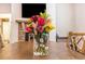 Dining room featuring a vase of flowers as a centerpiece, adding natural beauty to the space at 1190 Mosspointe Dr, Roswell, GA 30075