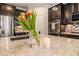 Kitchen featuring a granite countertop, stainless steel appliances, and dark cabinetry at 1190 Mosspointe Dr, Roswell, GA 30075