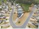 Aerial shot displaying a home in a tranquil neighborhood with established landscaping at 2814 Pine Valley Nw Way, Kennesaw, GA 30152