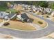 Aerial view of a well-kept home in a quiet neighborhood with mature trees and manicured lawns at 2814 Pine Valley Nw Way, Kennesaw, GA 30152