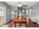 Cozy dining area featuring a spiral staircase, hardwood floors, and easy access to the backyard at 2814 Pine Valley Nw Way, Kennesaw, GA 30152