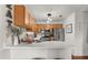 Bright eat-in kitchen with stainless steel appliances and a breakfast bar overlooking the dining area at 2814 Pine Valley Nw Way, Kennesaw, GA 30152