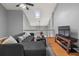 Cozy second-floor living area with ample seating and natural light from a skylight at 2814 Pine Valley Nw Way, Kennesaw, GA 30152