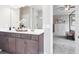 Bathroom with a gray cabinet and double sinks at 321 Silver Leaf Trce, Douglasville, GA 30134