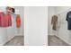 Walk-in closet with organized shelving and clothing racks for ample storage at 321 Silver Leaf Trce, Douglasville, GA 30134