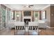 Bright and airy living room with a fireplace, plush sofas, stylish chairs, and elegant decor at 321 Silver Leaf Trce, Douglasville, GA 30134