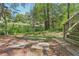 Spacious backyard featuring a stairway to the back porch and plenty of green space at 952 Columbia Dr, Decatur, GA 30030
