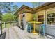 Inviting front porch offering a cozy seating area with stylish accents at 952 Columbia Dr, Decatur, GA 30030