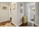 Hallway that leads to a full bath with tile flooring and a glass enclosed shower at 952 Columbia Dr, Decatur, GA 30030
