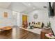 Bright living room with hardwood floors, stylish furnishings, and modern decor at 952 Columbia Dr, Decatur, GA 30030