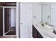Bathroom featuring double vanity sinks, a walk-in shower with glass door at 1147 Laurel Valley Ct, Buford, GA 30519