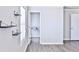 Bright bedroom featuring neutral walls, wood-look floors and a walk-in closet at 1147 Laurel Valley Ct, Buford, GA 30519
