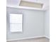 Bright bedroom features a window for ample natural light and wood-look flooring at 1147 Laurel Valley Ct, Buford, GA 30519