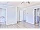 Spacious bedroom with neutral walls, wood-look floors and a walk-in closet at 1147 Laurel Valley Ct, Buford, GA 30519