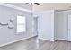 Bright bedroom with wood-look floors and contemporary wall decor at 1147 Laurel Valley Ct, Buford, GA 30519