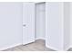 Bright closet with rod and wood-look flooring at 1147 Laurel Valley Ct, Buford, GA 30519