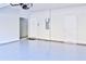 Spacious garage with epoxy flooring, perfect for parking and storage solutions at 1147 Laurel Valley Ct, Buford, GA 30519