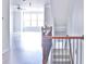 Bright stairwell with gray walls and hardwood floors at 1147 Laurel Valley Ct, Buford, GA 30519