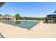 Community pool with a tarp cover, patio area and lounging options at 2130 Hollowbrooke Nw Way, Acworth, GA 30101