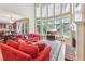 Bright living room with a fireplace, large windows, and comfortable seating at 2130 Hollowbrooke Nw Way, Acworth, GA 30101