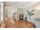 Sitting room with hardwood floors, a comfortable chair and a plant at 2130 Hollowbrooke Nw Way, Acworth, GA 30101
